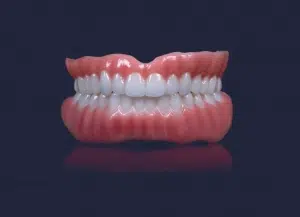 Dentus perfectus stomatološka ordinacija - najbolje totalne zubne proteze Fotografija totalne, ružičaste akrilne zubne proteze za gornju i donju čeljust - Dentus perfectus stomatološka ordinacija
