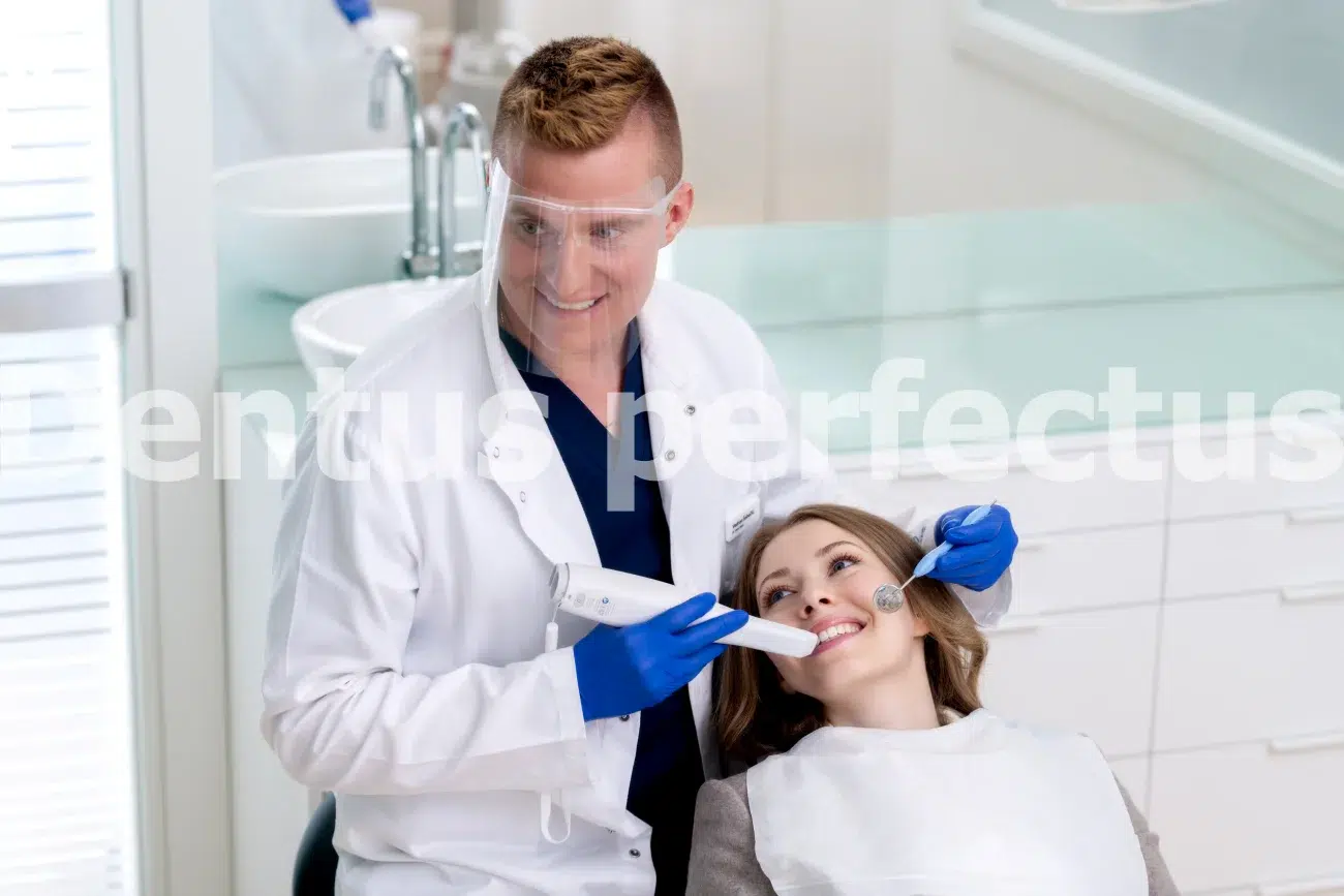 Implantology in Dentus perfectus dentistry - Zagreb Implantology in Dentus perfectus dentistry - Zagreb - dentist and the patient during intraoral scanning process