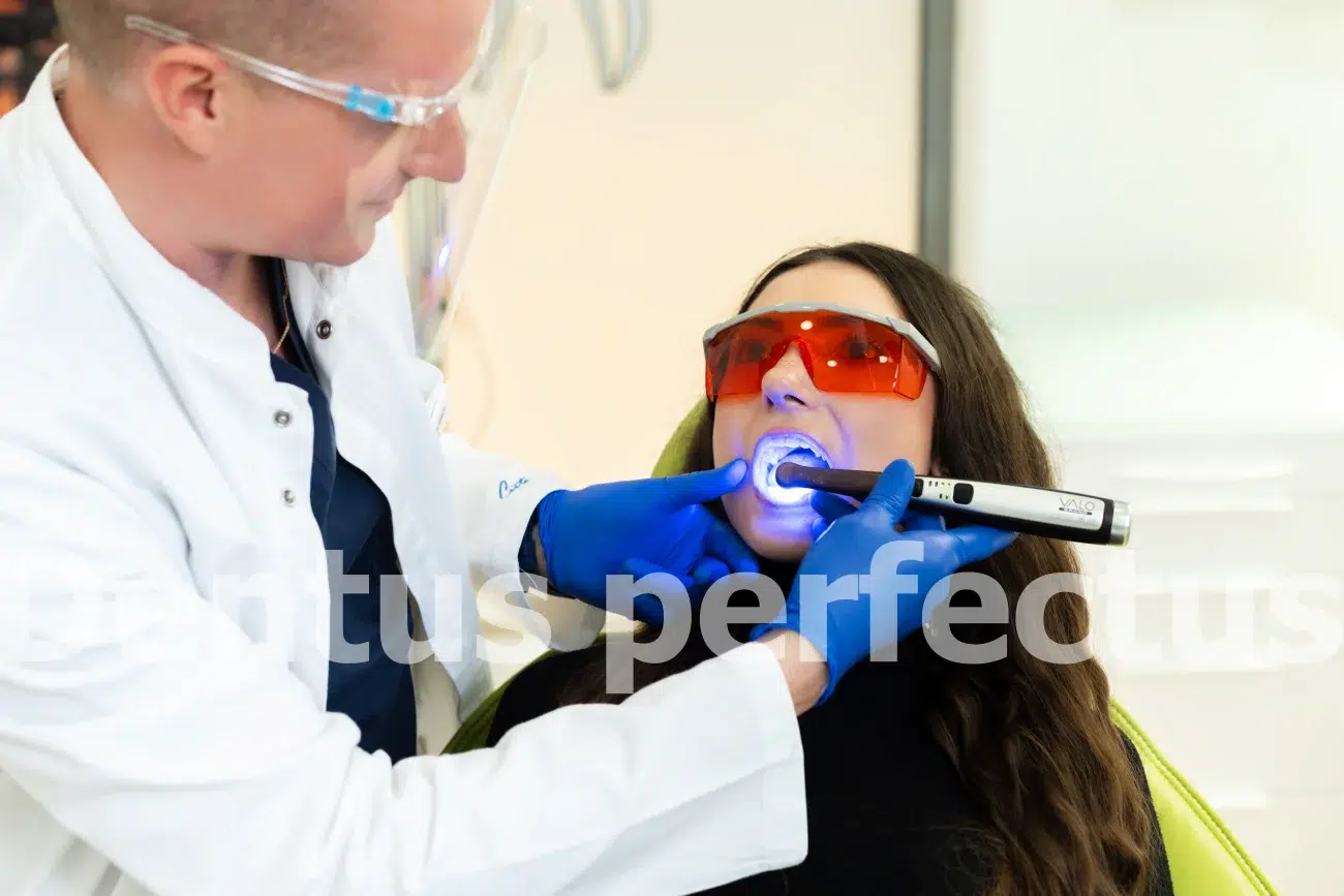 Tooth repair - picture shows procedure Tooth repair - picture shows procedure in Dentus perfectus dental chair
